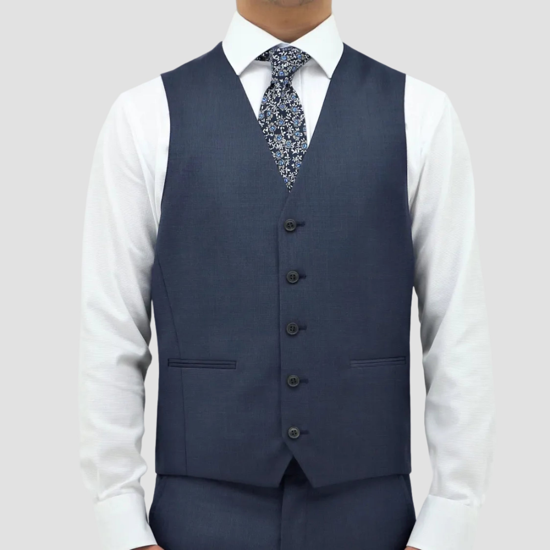 Men’s Ryan blue vest by Boston, crafted in Australian merino wool with a classic fit, V‑neck and jetted pockets.