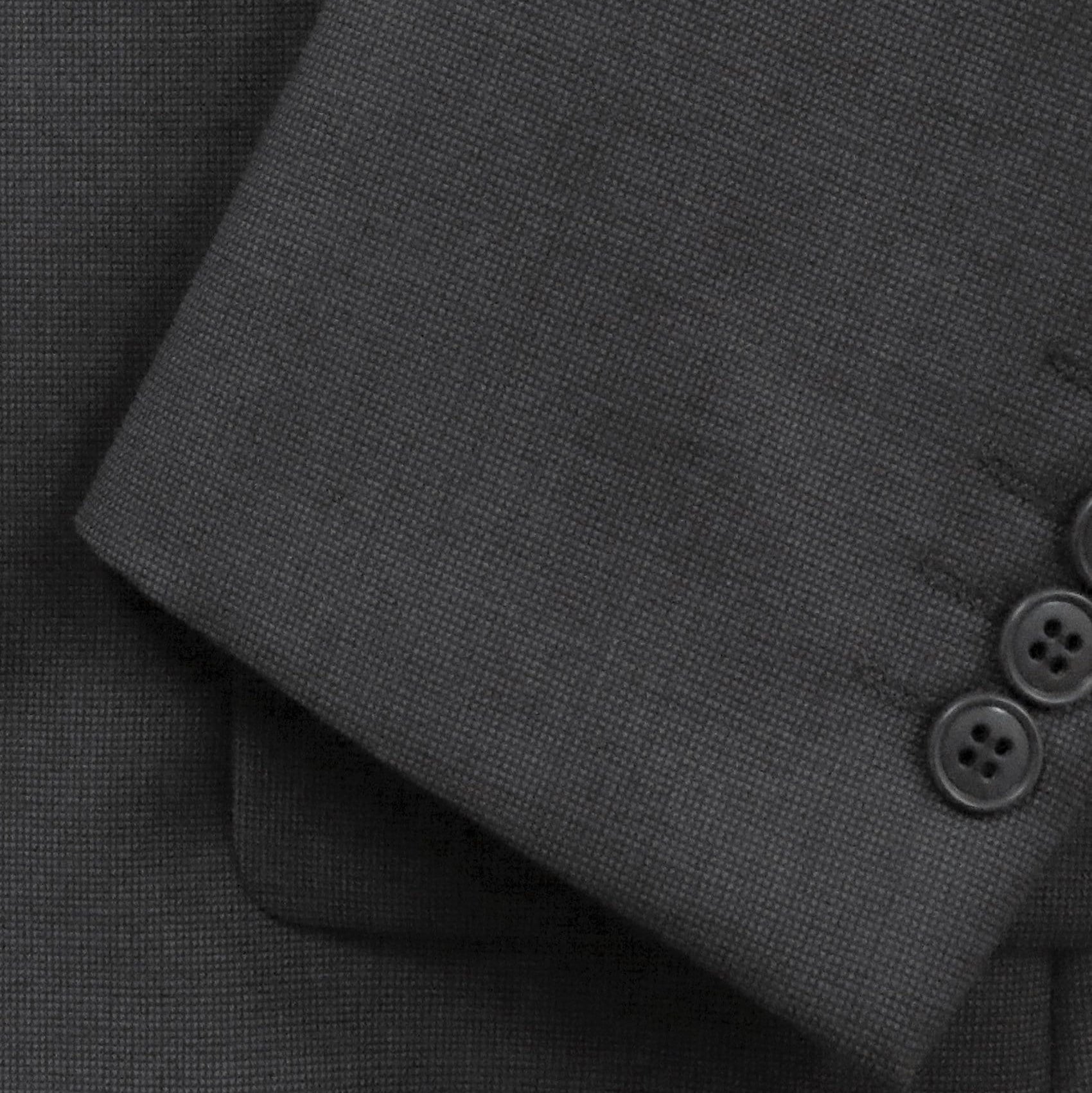 Boston’s Michel charcoal comfort‑fit suit with notch lapel, flap pockets and straight‑leg trousers.