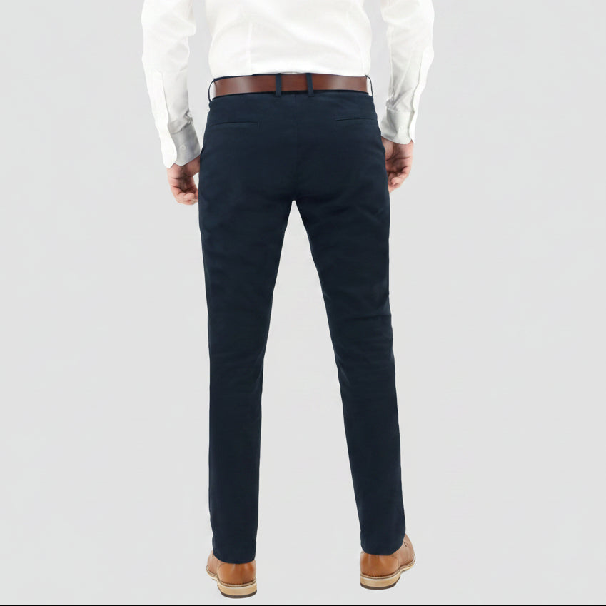 the rear view of the daniel hechter slim fit navy cotton stretch chinos worn with a white shirt and a tan leather shoe