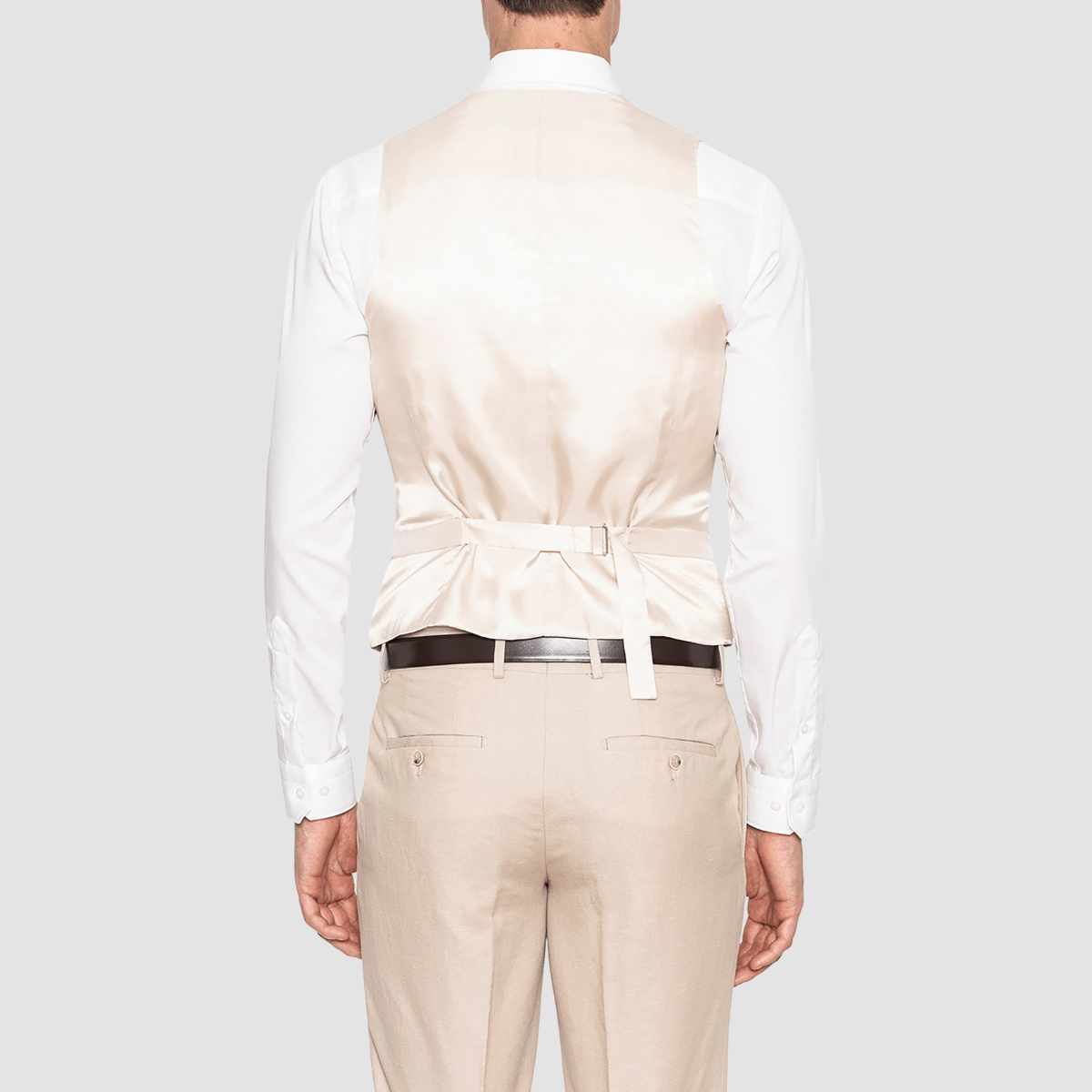 the satin back of the vest showing the adjuster straps
