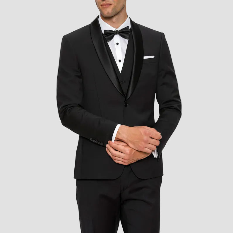 A close view of the satin shawl lapel on the Gibson slim fit spectre evening tuxedo jacket in black pure wool F34087