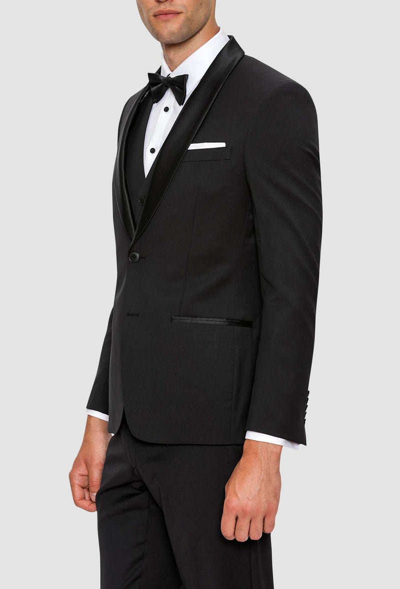 A side view of theGibson slim fit spectre evening suit in black pure wool F34087