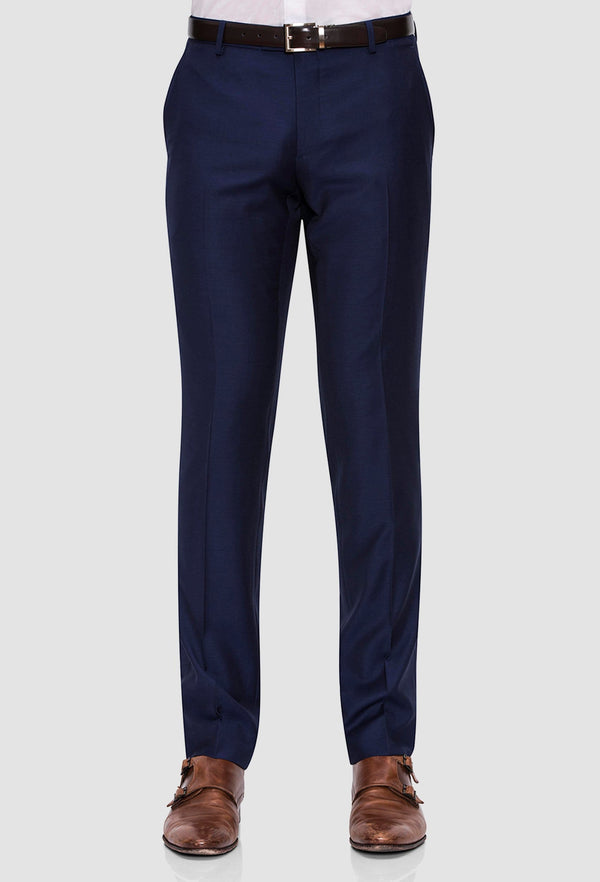 a front view of a model wearing the Joe Black slim fit razor trouser in navy pure wool