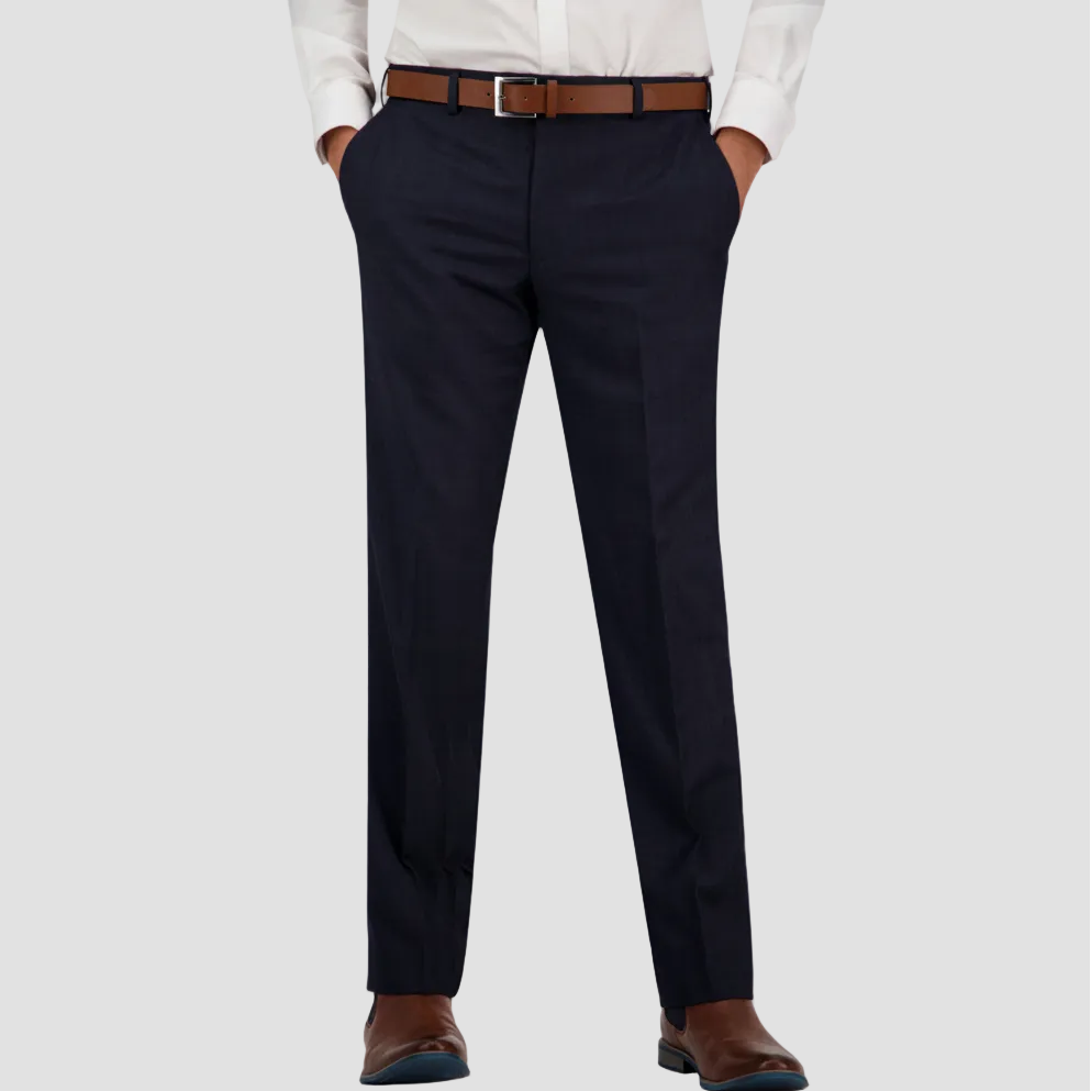 Navy dress pants in Australian merino wool by Savile Row worn with a white shirt and brown leather belt and boots.