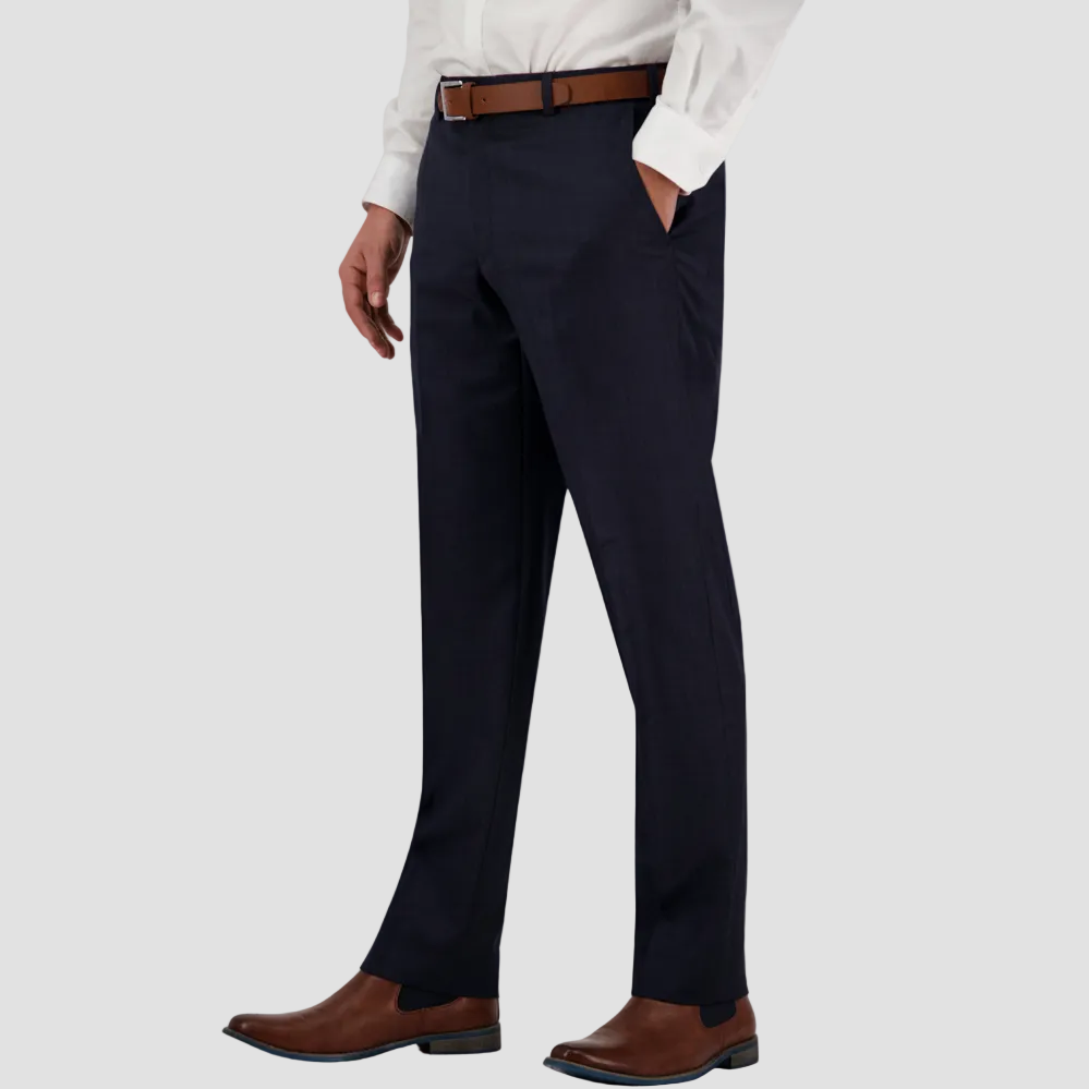 Navy dress pants in Australian merino wool by Savile Row worn with a white shirt and brown leather belt and boots.