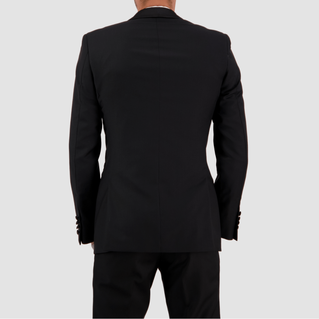 Back of the Savile Row men's black tuxedo jacket with a tailored fit