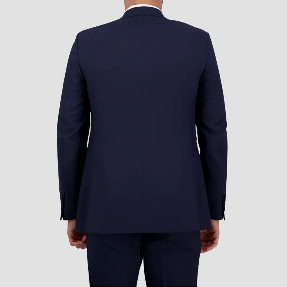 A navy tailored wool‑blend suit with performance finish by Savile Row.
