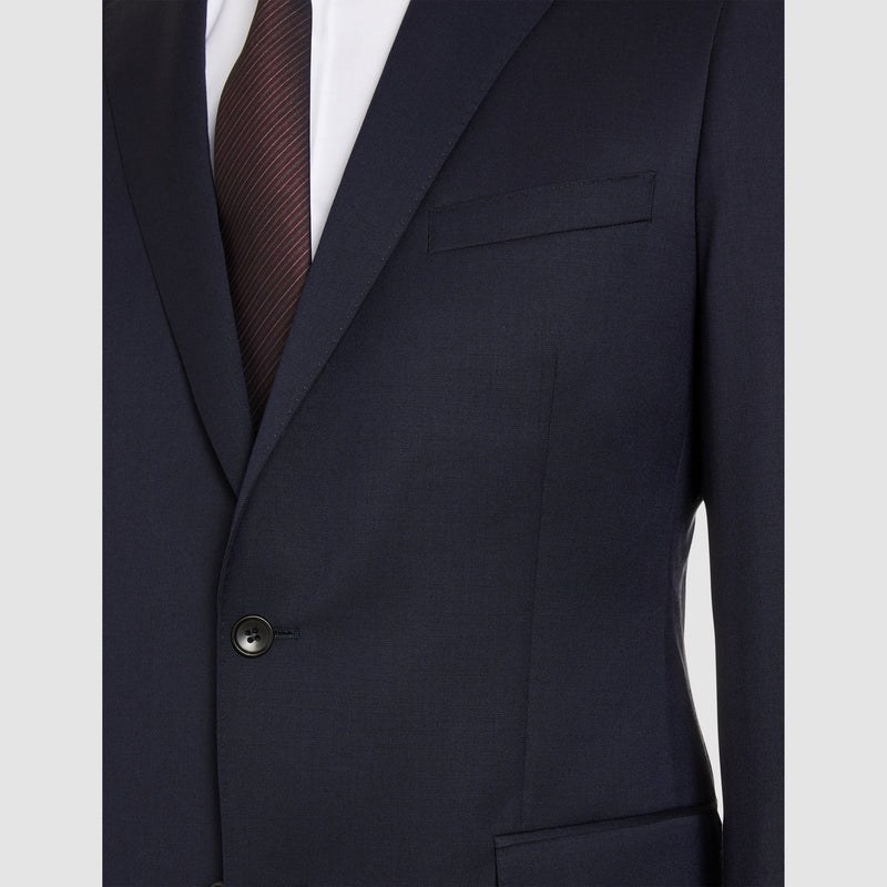 A close up view of the notch lapel on the studio italia classic fit icon george suit jacket  in navy wool blend 