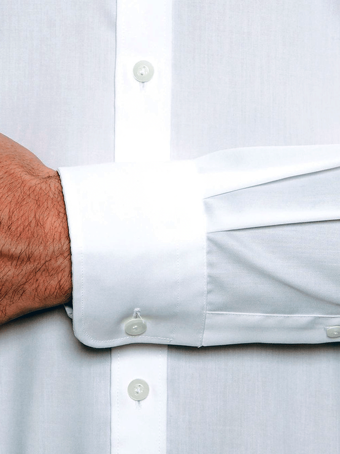 a close up of the regular cuff detail on the cambridge preston mens business shirt in white pure cotton.