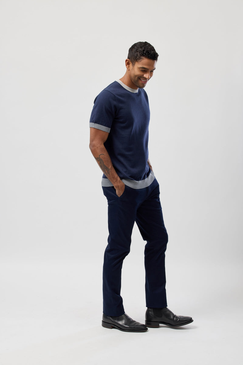 Brooksfield Mens Cotton Crew Neck Knitted Tee in Navy paired with black trousers