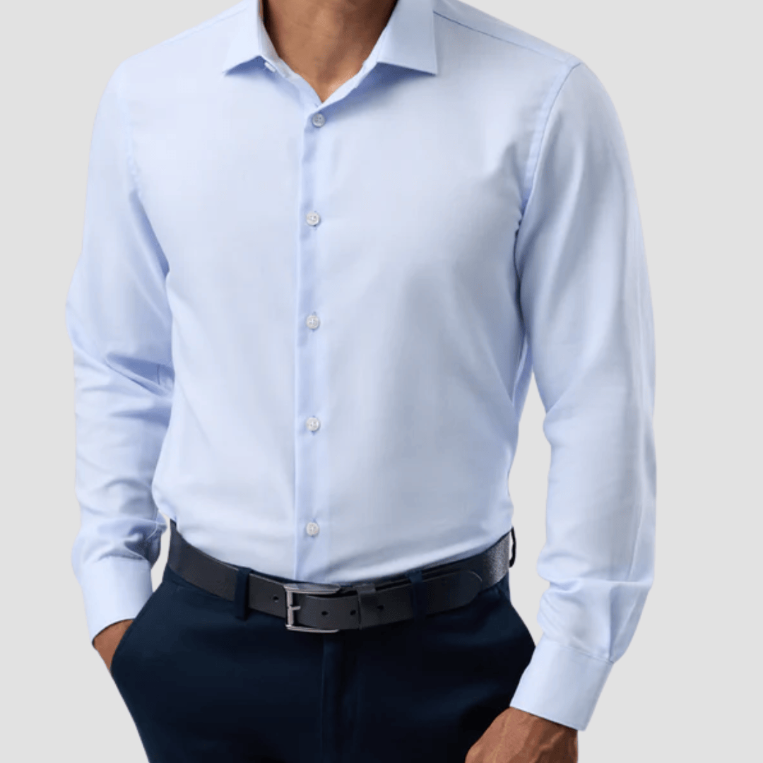 Light blue dress shirt worn by a person 