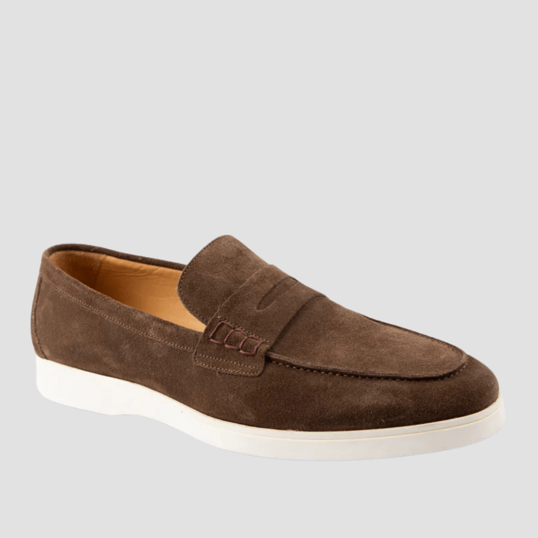 Brown suede loafer shoe on a light gray background