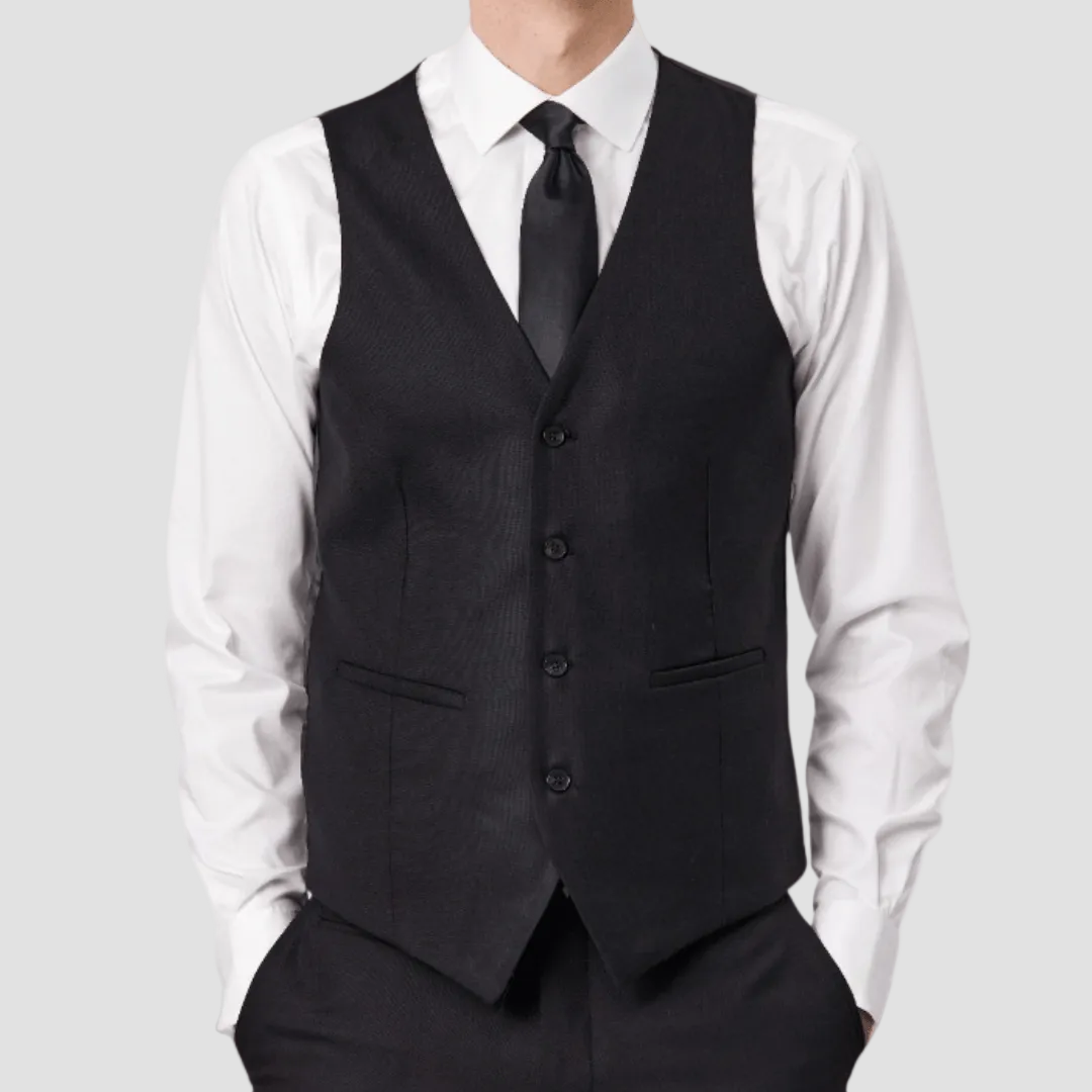 Black vest by Savile Row over a white shirt