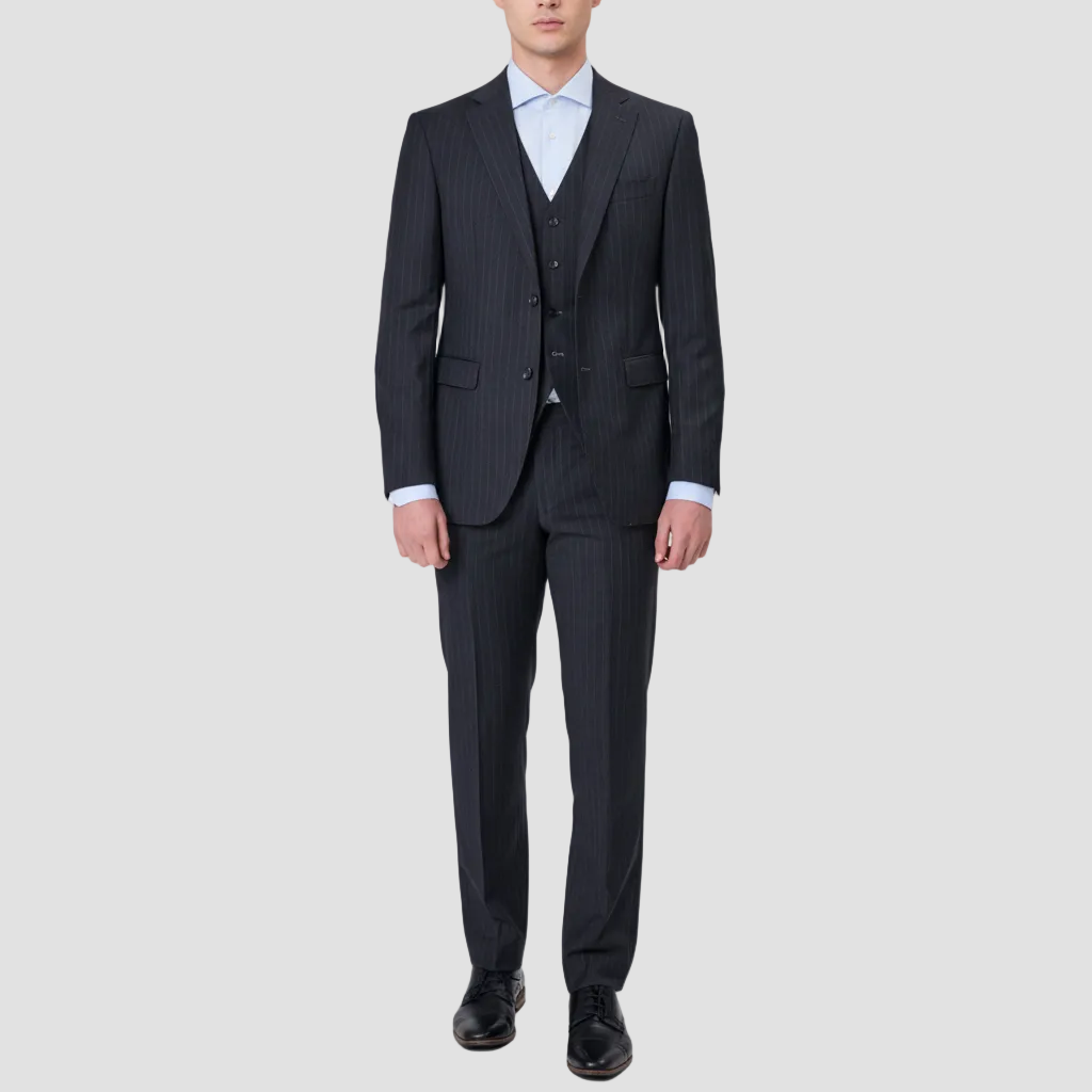 Charcoal pinstripe suit in Australian Merino Wool by Savile row with a light coloured shirt and black leather shoes.