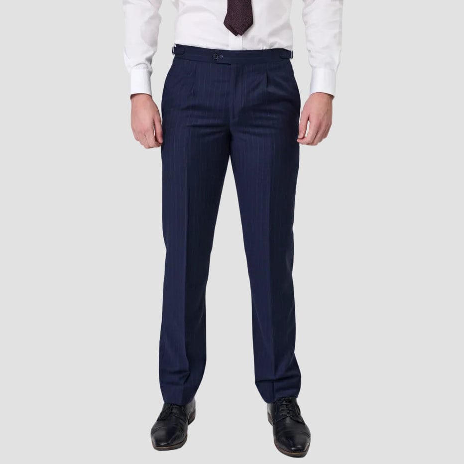 Man wearing an Australian Merino Wool navy blue stripe suit with a white shirt by Savile Row.