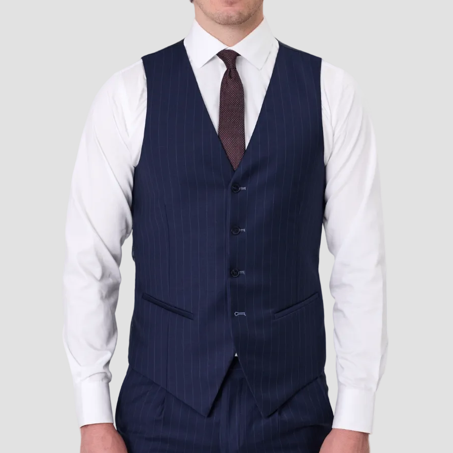 Man wearing a navy pinstripe suit vest by Savile Row with a white shirt and maroon tie.