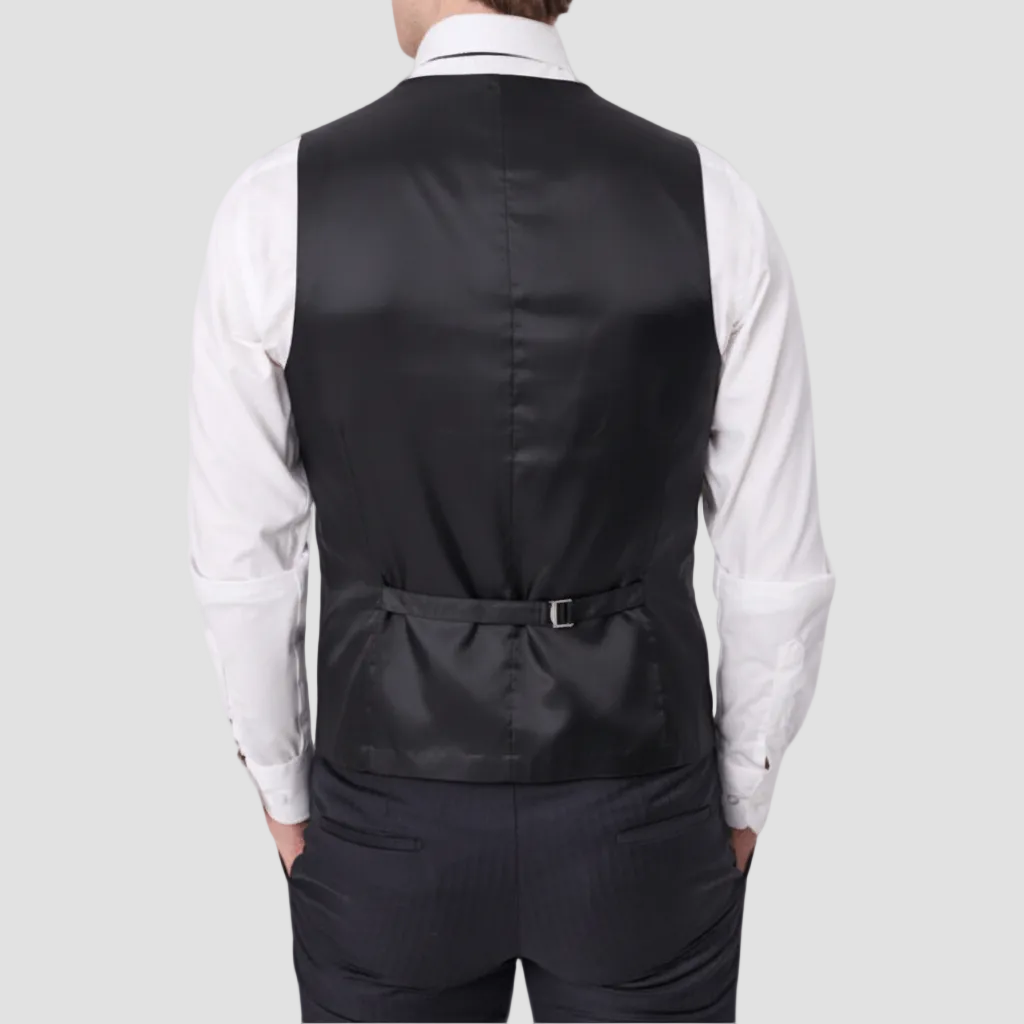 Tasmanian Wool vest with a satin backing, adjustable tab, paired with matching pants and a white shirt.