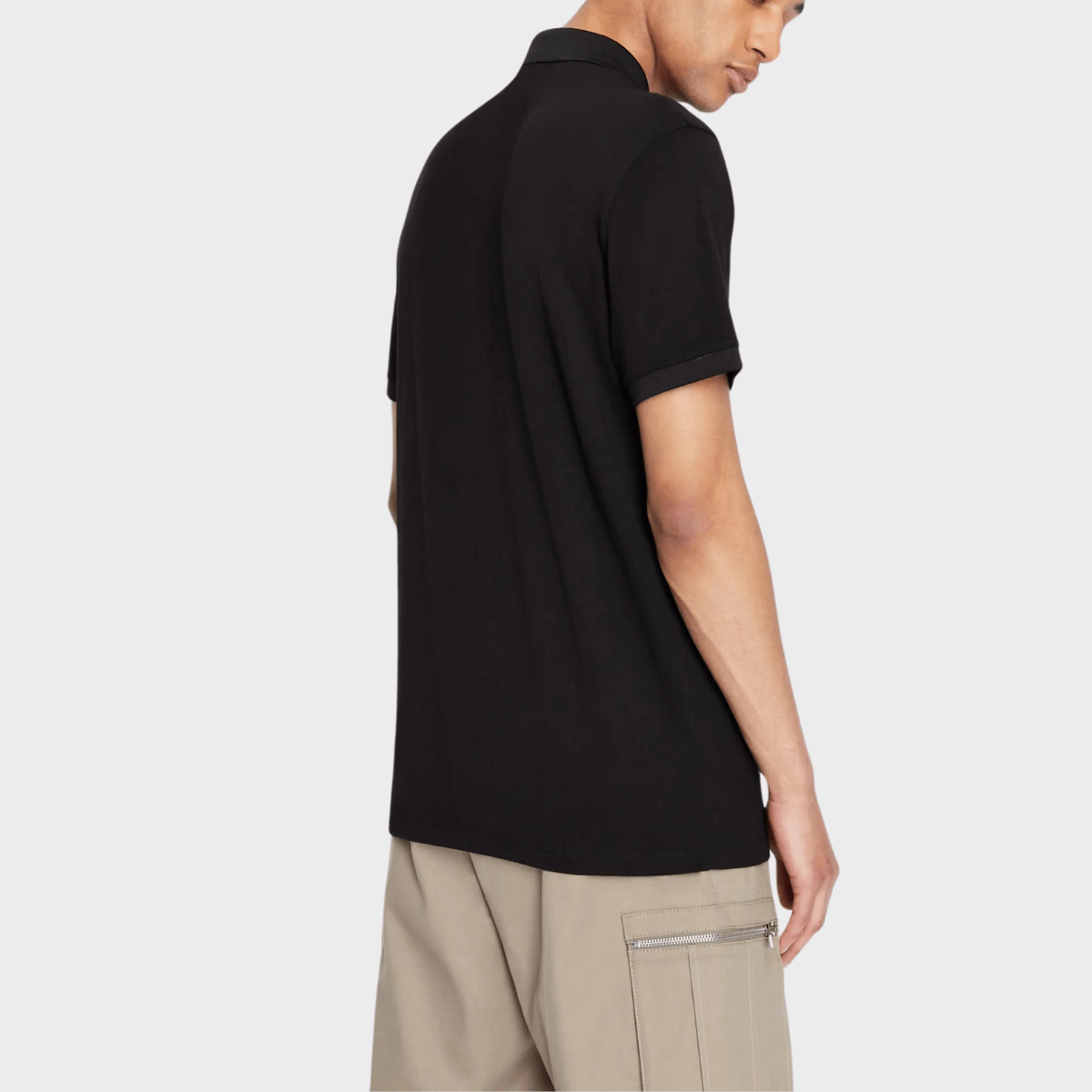 Back view of the black polo shirt by Armani