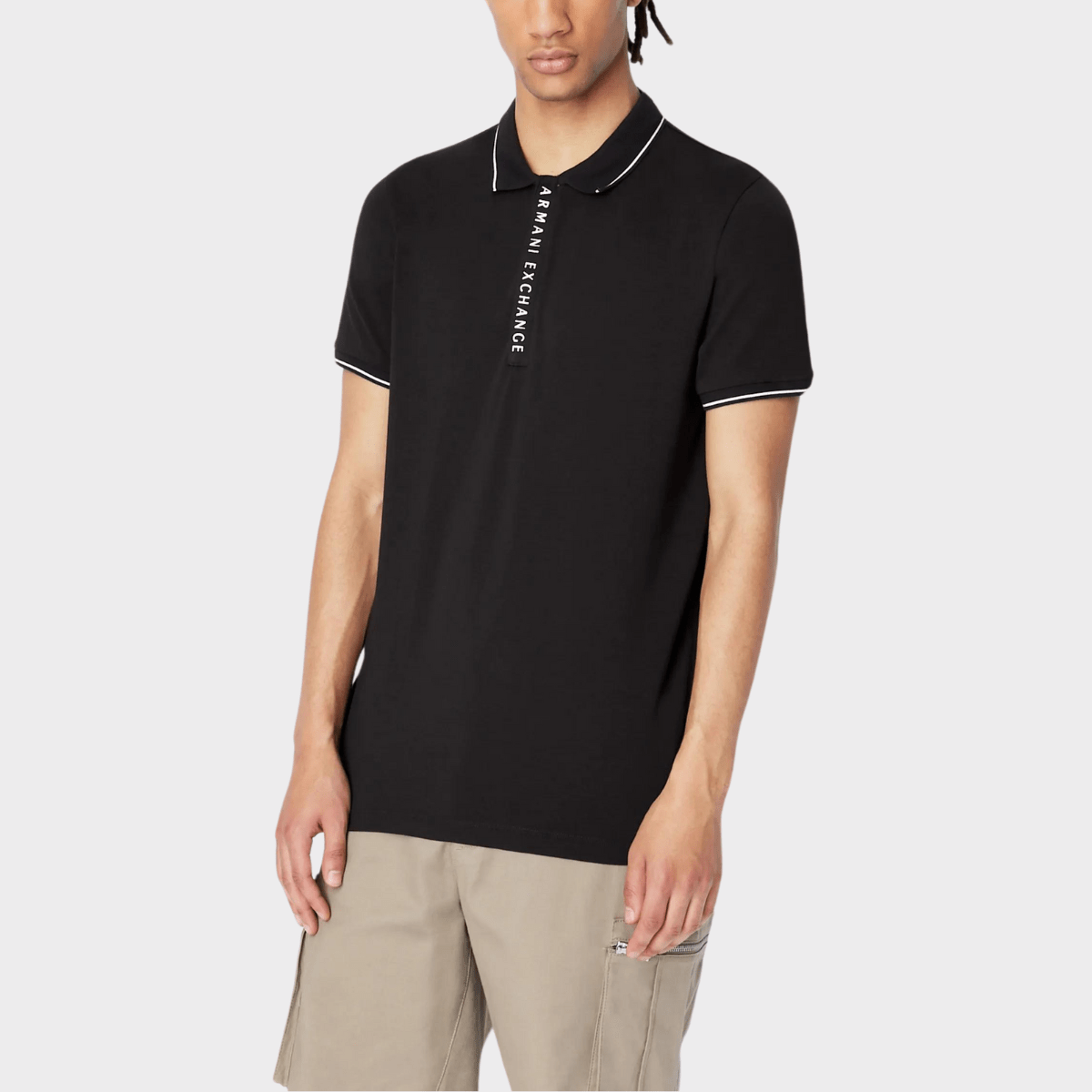 Front view of the Armani slim fit zip neck polo in black cotton.