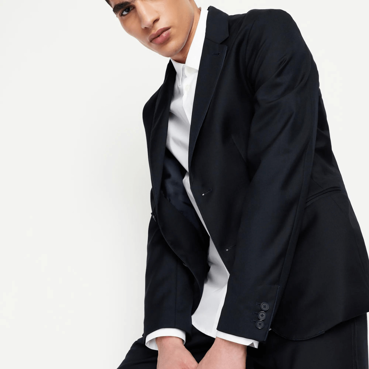 Styling the business casual Armani cotton shirt with a black blazer.