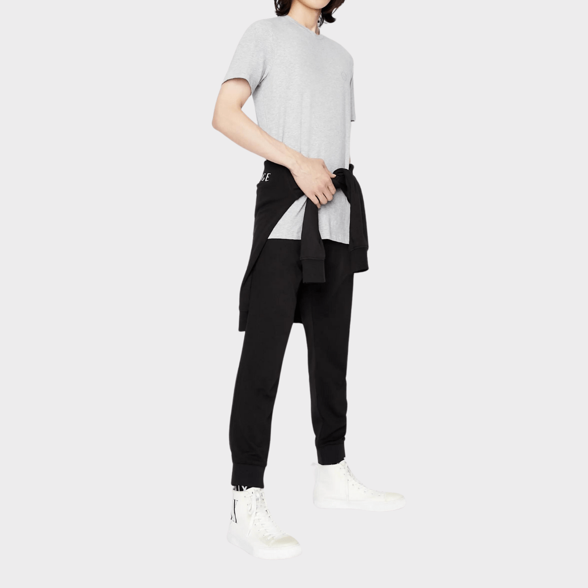 The Armani slim fit casual pants aired with a bomber jacket and plain shirt.