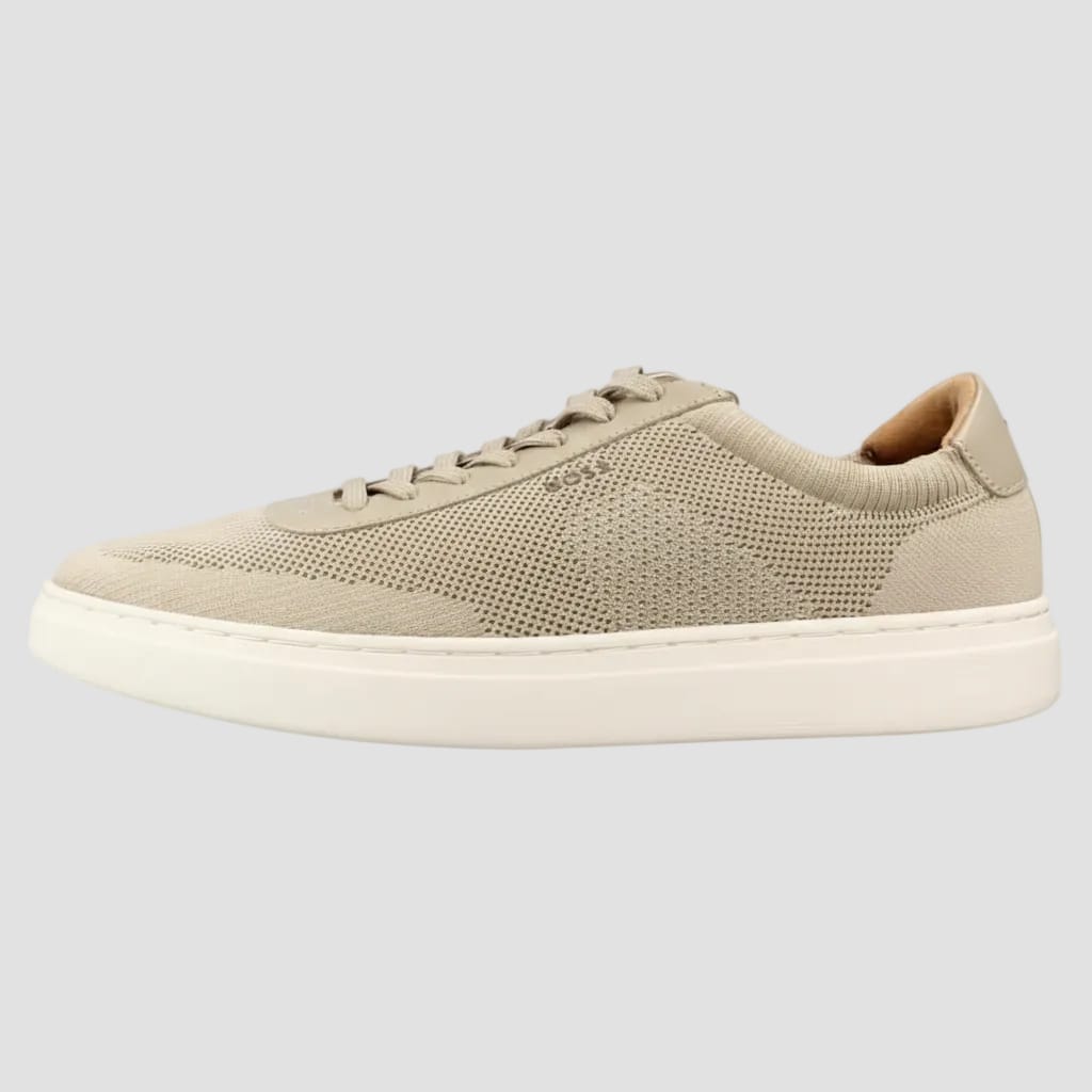 A light beige knit and mesh sneaker with matching beige laces and a thick white sole, shown from a side profile view on a white background.