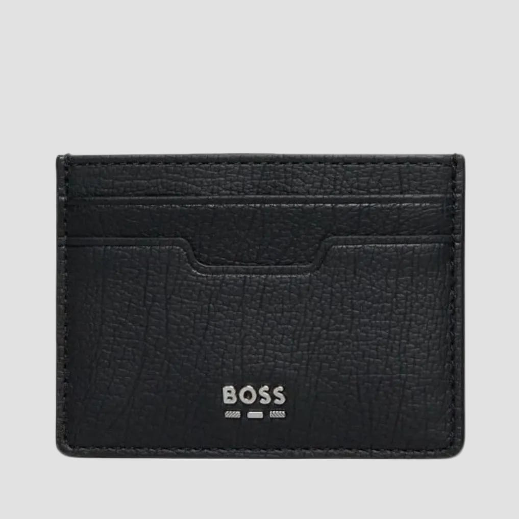 A black textured leather card holder wallet with the silver 'BOSS' logo printed on the front, set against a plain white background.