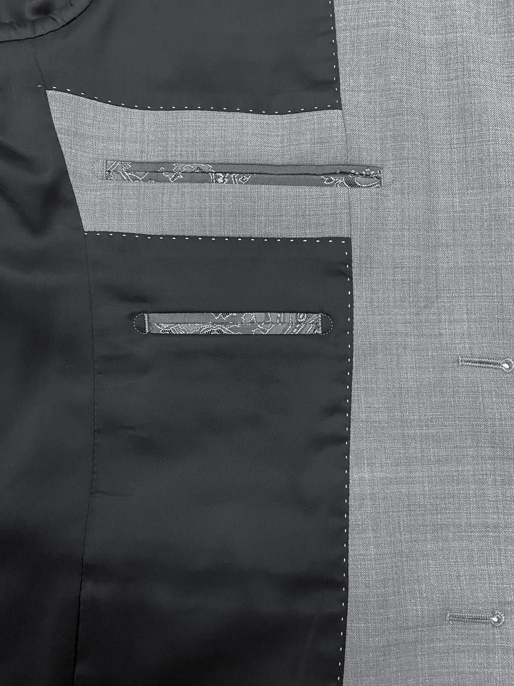 Men’s Lazio grey suit by Boston, crafted in a stretch merino wool blend with sharp tailoring and slim trousers.