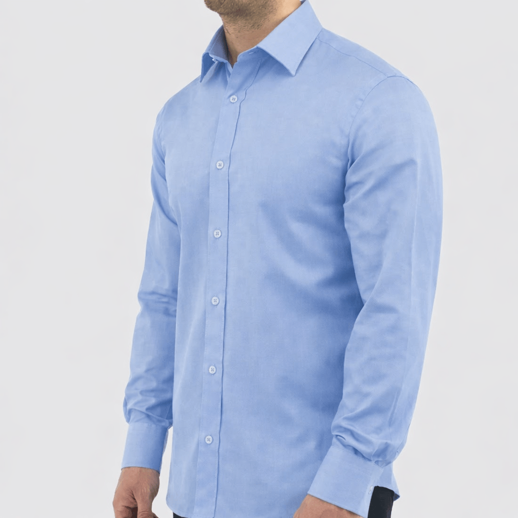 Boston’s Liberty blue business shirt in a modern slim fit with classic collar and tailored darts. 