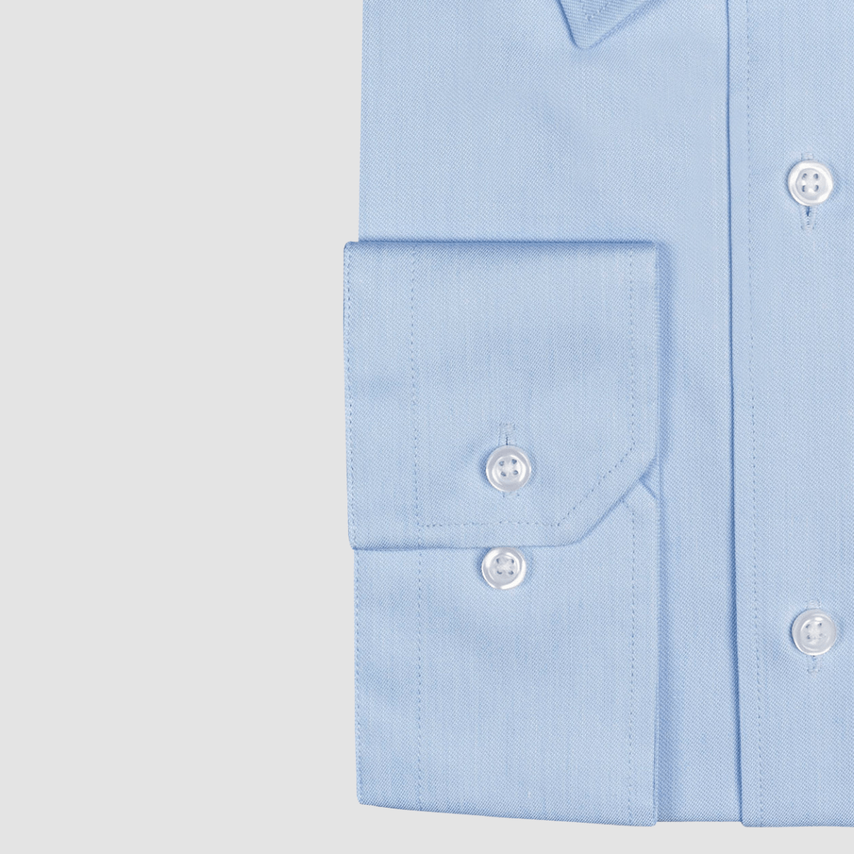 Boston’s Liberty blue business shirt in a modern slim fit with classic collar and tailored darts. 