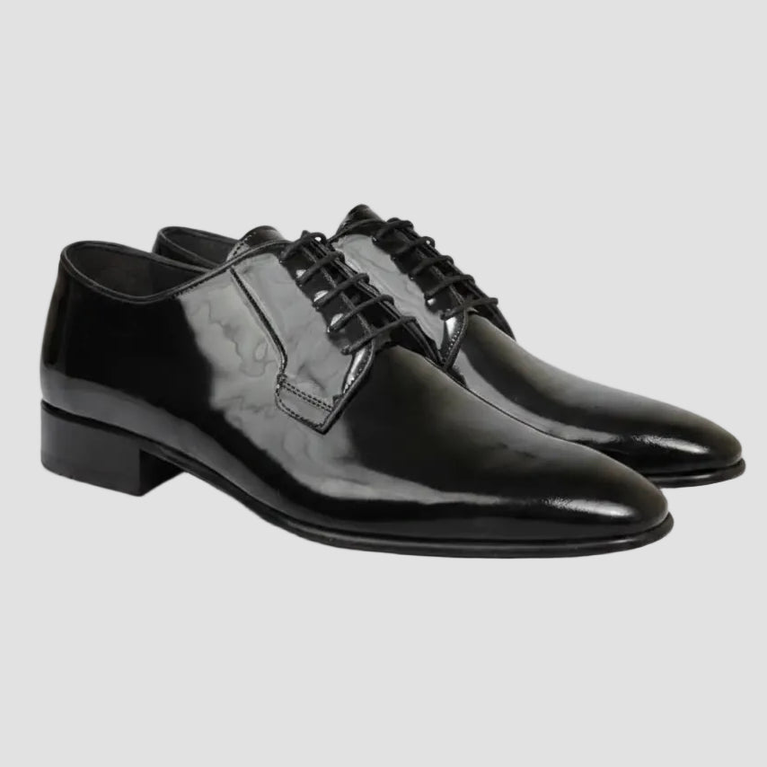 Men’s Ellis Derby shoes by Brando, crafted from polished leather with a chisel toe and stacked heel.