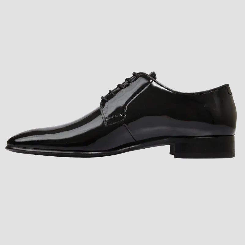 Men’s Ellis Derby shoes by Brando, crafted from polished leather with a chisel toe and stacked heel.