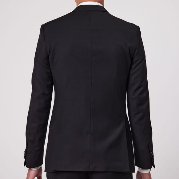 Bruton’s David Keystone slim‑fit black suit with performance finish.
