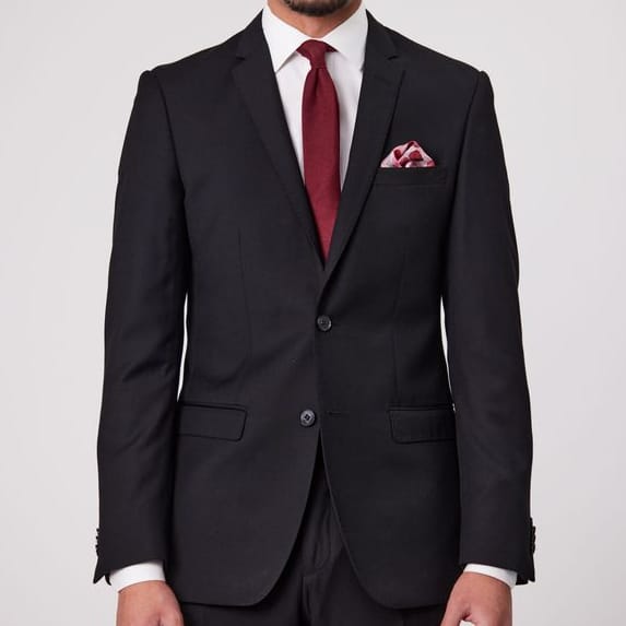 Bruton’s David Keystone slim‑fit black suit with performance finish.