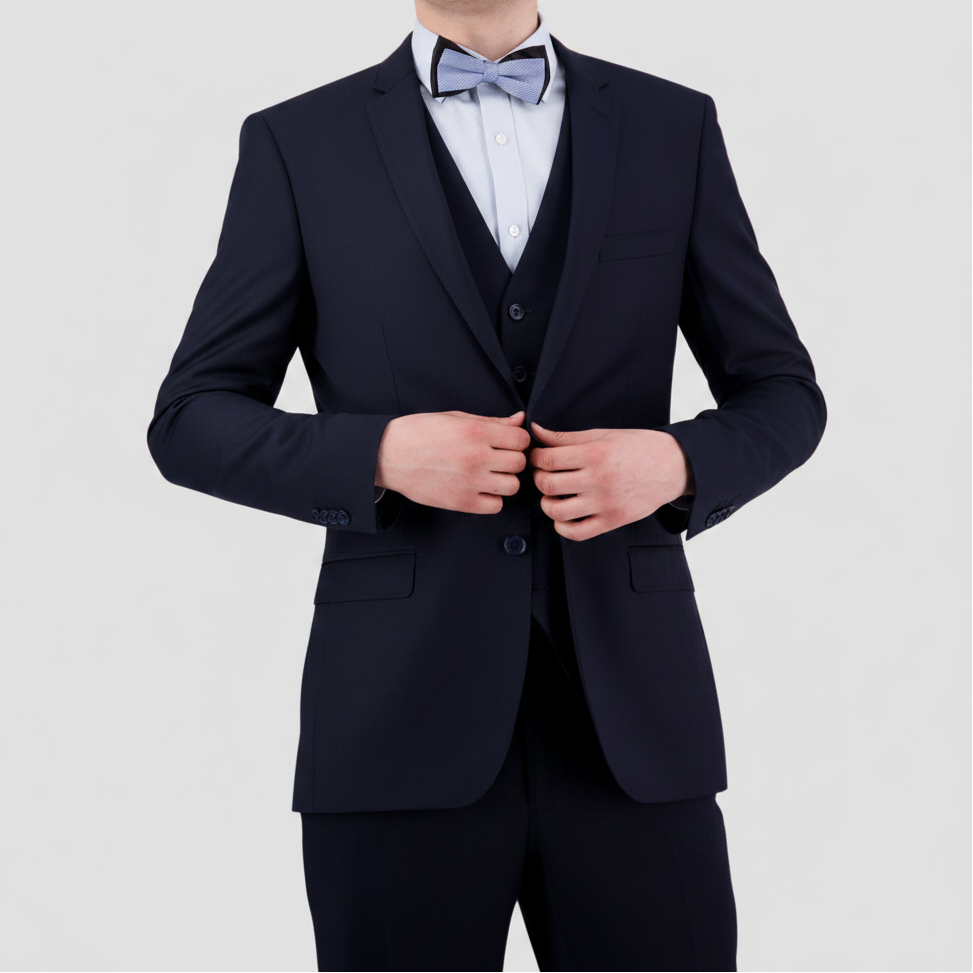 Bruton’s David Keystone slim‑fit navy suit with performance finish.