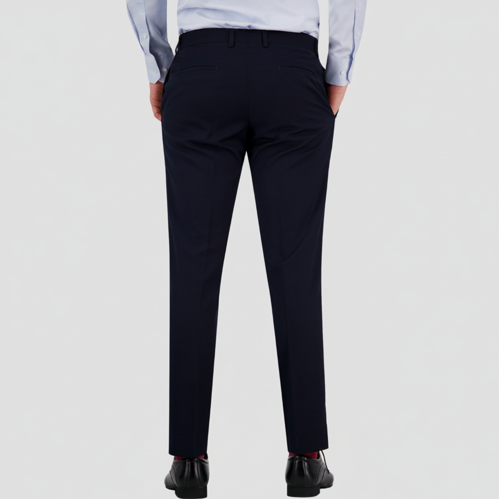Bruton’s Jesse Keystone slim‑fit navy trousers, half lined with a finished leg and soft‑structured feel.