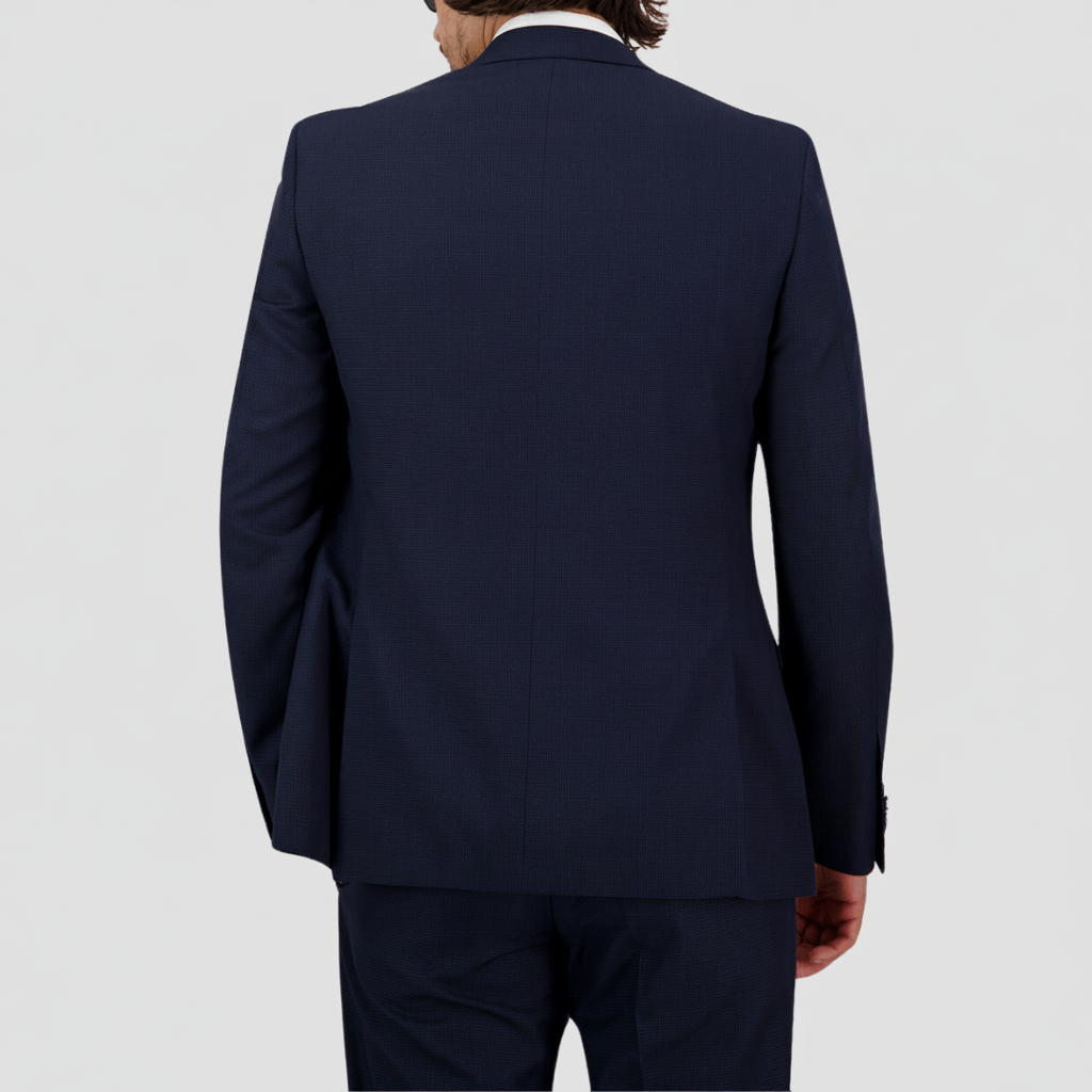 Bruton’s Jose Jadestone slim‑fit charcoal‑blue houndstooth suit with performance finish, tailored jacket and trousers.