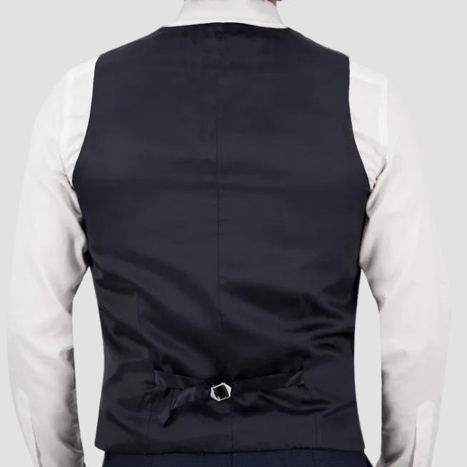 Slim‑fit charcoal houndstooth suit vest by Bruton with four‑button front and adjustable back.