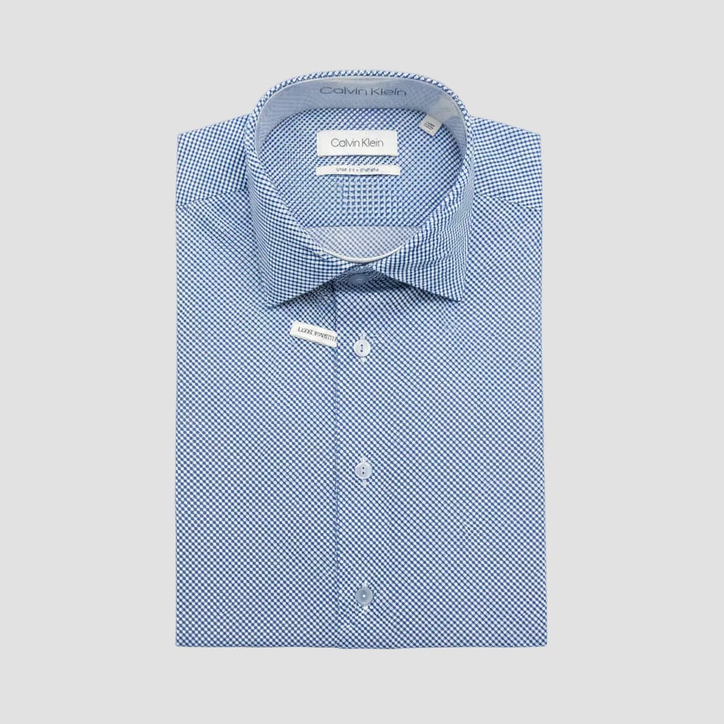 Blue checkered shirt with Calvin Klein label on a reflective surface
