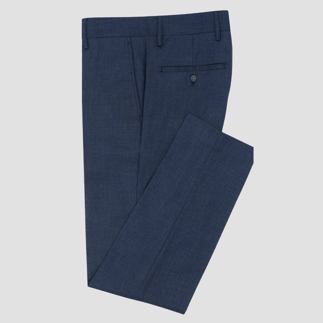 A navy slim fit Turin Edward preset suit by Christian Brookes with peak lapel and tapered Edward trousers.