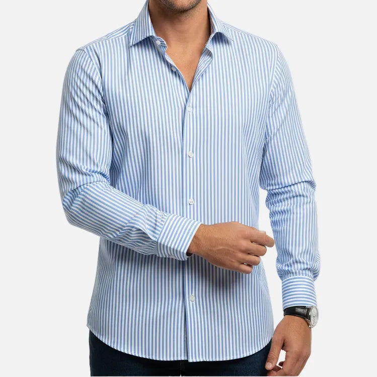 A folded light blue and white striped dress shirt with a pointed collar, button-down front, and a single-button cuff, shown on a plain white background. The neck label reads 'HECHTER PARIS'.