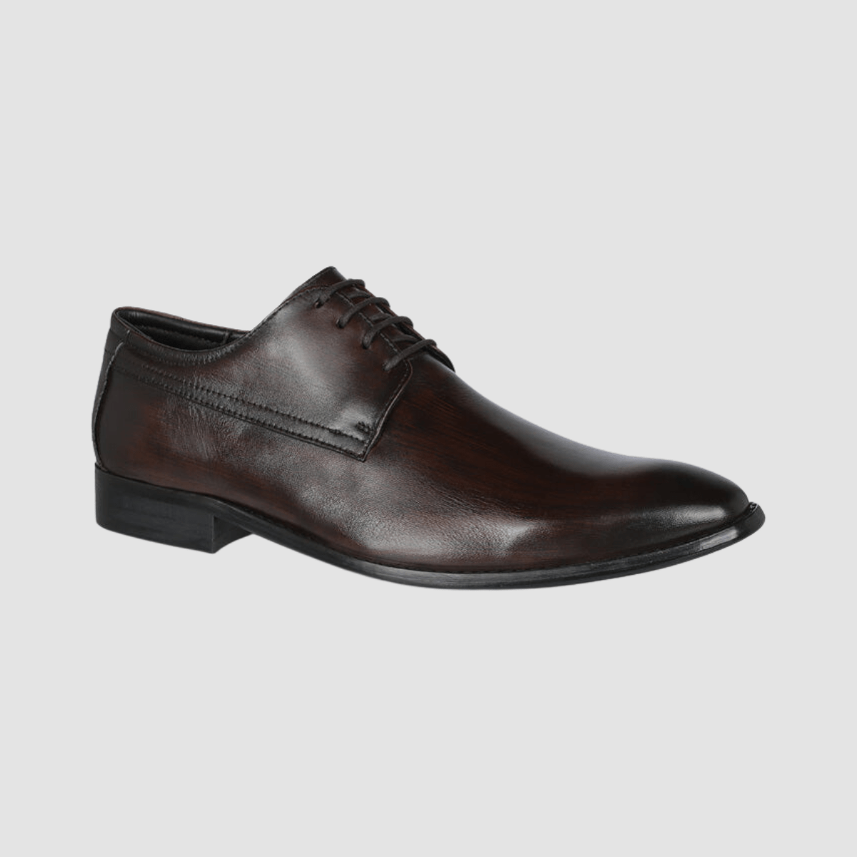 A brown Ferracini Hendrix men's leather dress shoe with lace-up closure and a leather sole.