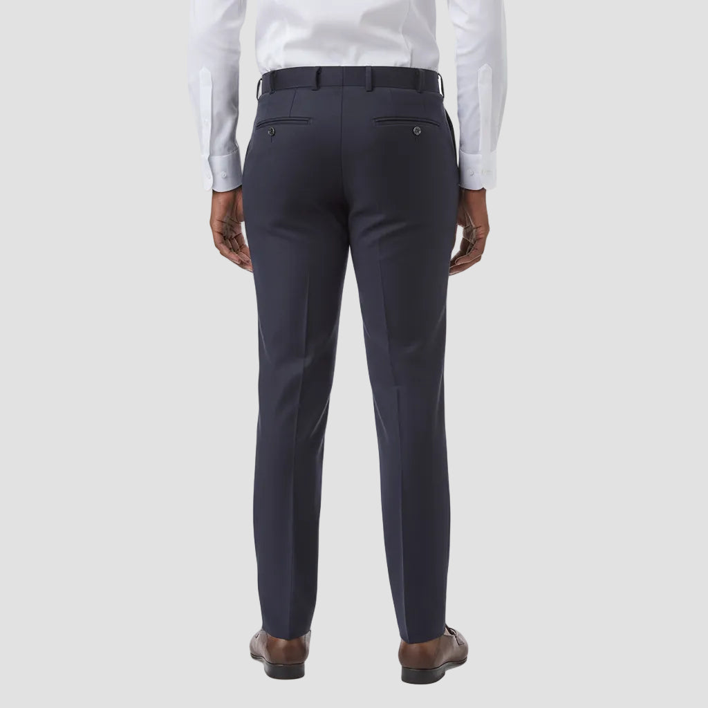 Dark navy dress pants worn by a person 