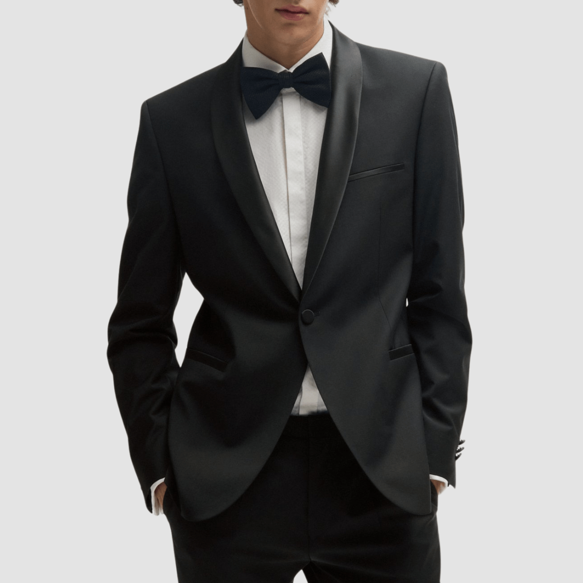 The Arti‑Getlin black tuxedo by Hugo—super slim fit, satin trims, and shawl lapel.