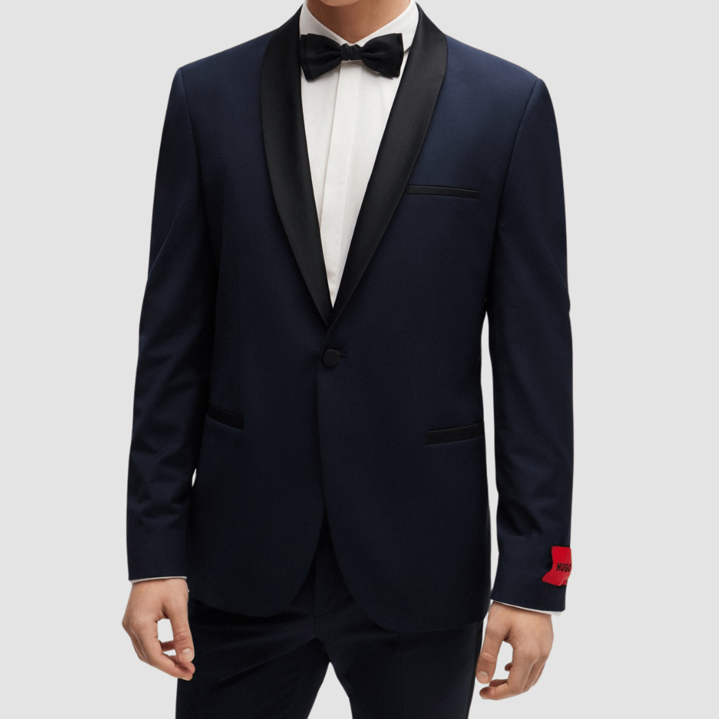 The Arti‑Getlin dark blue tuxedo by Hugo—super slim fit with black satin trims and shawl lapel.