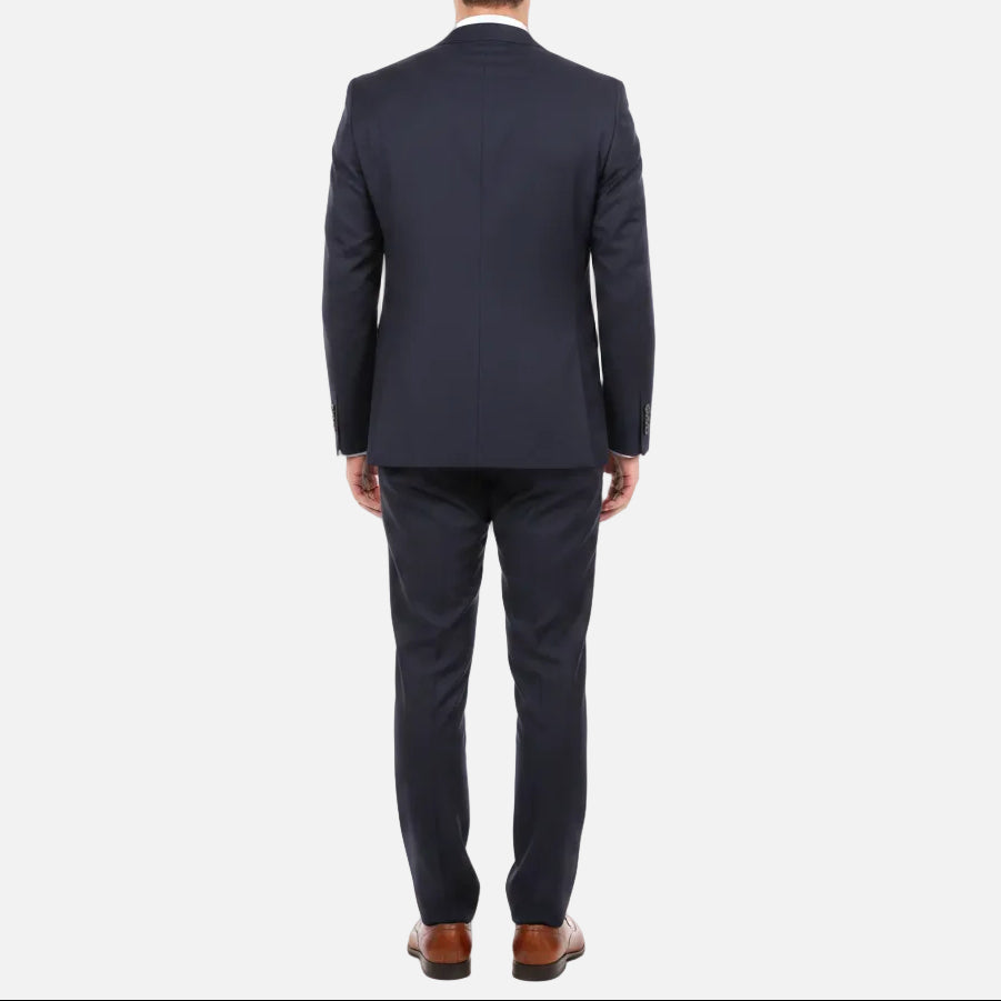Slim fit Penn peak suit in navy wool stretch by Jenson.