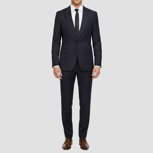 Slim fit Penn peak suit in navy wool stretch by Jenson.