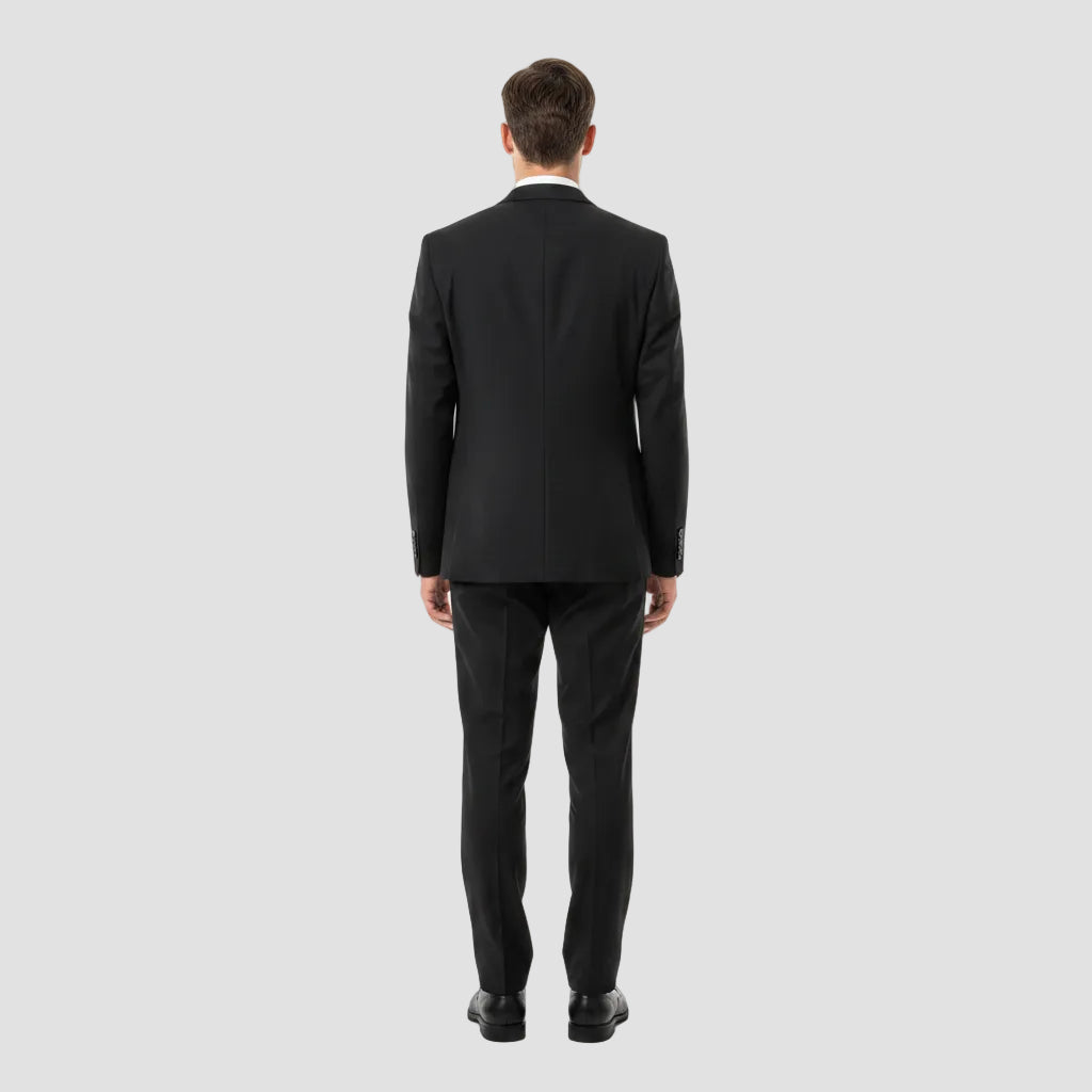 Dark gray jacket on a hanger against a white background