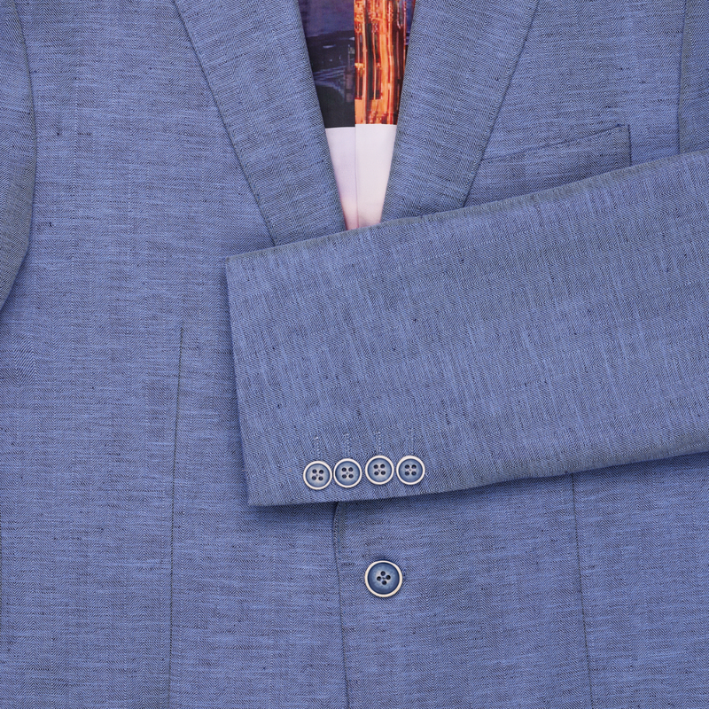 Cuffs and button details of the Savile Row Tailored Fit Mens Abram Suit Jacket in Sky Linen