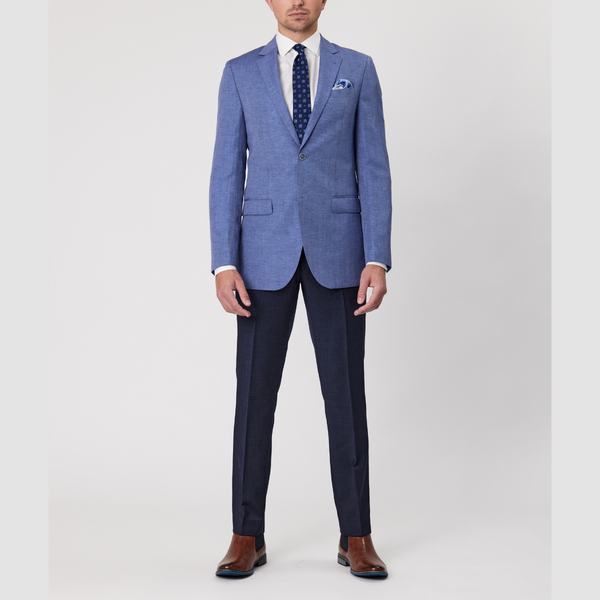 The Tailored Fit Mens Abram Suit Jacket by Savile Row paired with navy trousers.